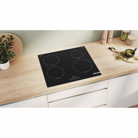 Индукционная варочная панель Bosch PUE611BB6E черная - фото 6